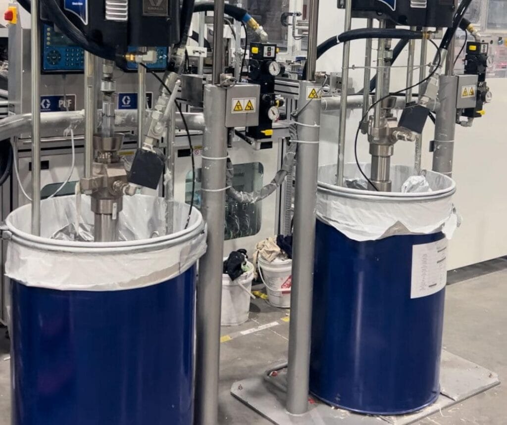 Large barrel silicone sealants are packaging.